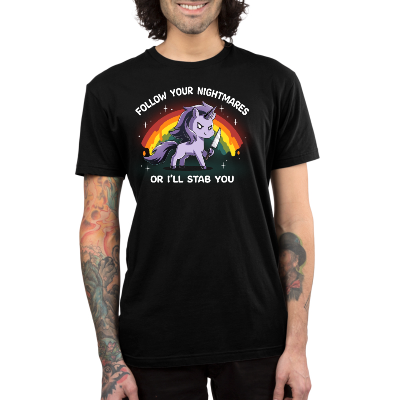 Premium Cotton T-shirt_TeeTurtle black Follow Your Nightmares Premium Cotton T-shirt featuring a light purple unicorn holding a knife in front of a drippy rainbow. The unicorn is smirking. The text reads "Follow Your Nightmares Or I'll Stab You." 