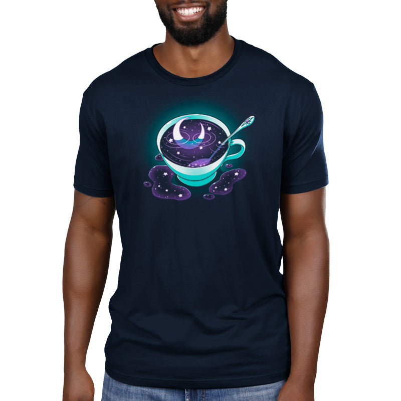 A man wearing a navy blue t-shirt with an image of a cup of Galactic Tea by TeeTurtle.