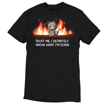 Men's Premium T-Shirt_TeeTurtle black I Definitely Know What I'm Doing Men's Premium T-Shirt featuring a smug gray cat standing confidently in front of bright flames with the text "Trust Me, I Definitely Know What I'm Doing."