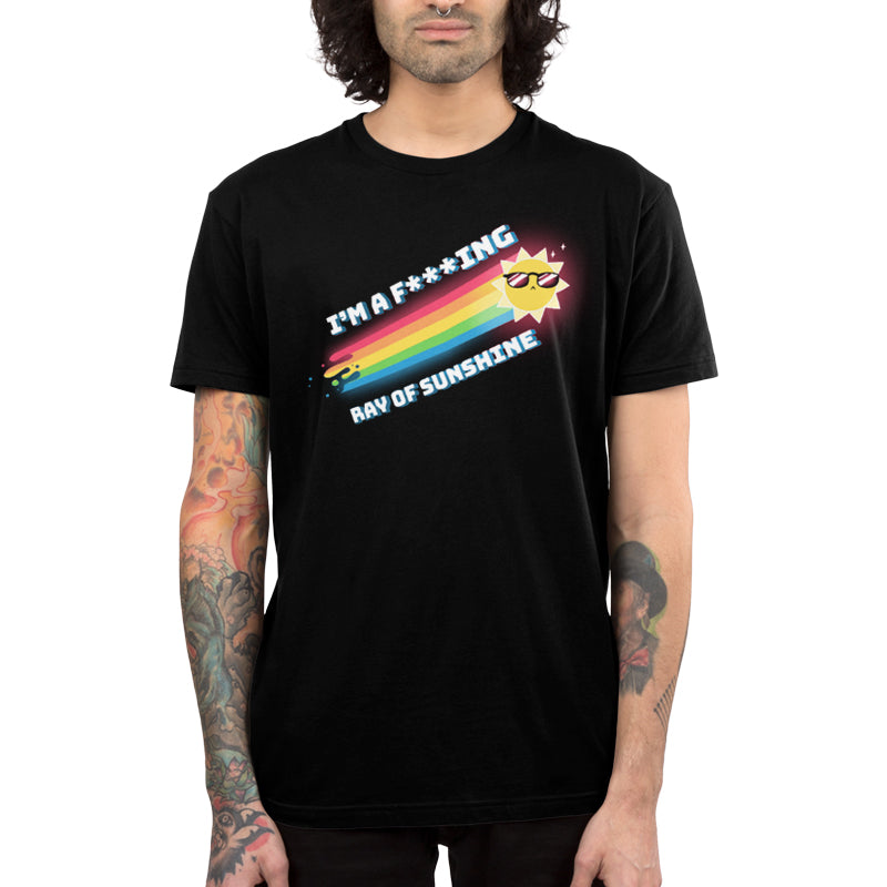 A man wearing a black t-shirt with "I'm a F***ing Ray of Sunshine" by TeeTurtle.