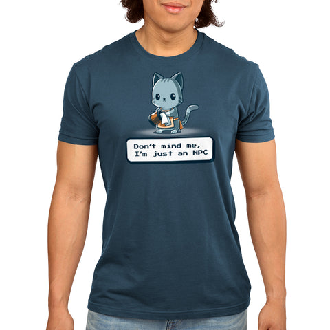Premium Cotton T-shirt_TeeTurtle denim blue I'm Just An NPC apparel featuring a cat in an apron with a blank expression cleaning a mug. Caption below reads, "Don't mind me, I'm just an NPC".