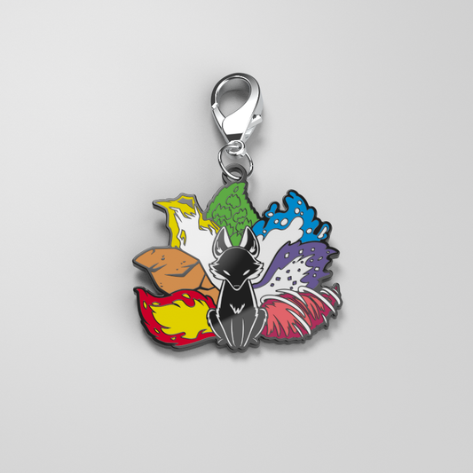 An Elemental Kitsune Enamel Keychain by TeeTurtle with a cat image adorned with leaves, perfect for personal style.