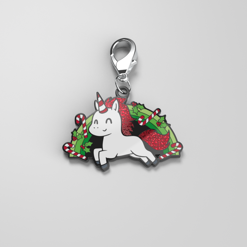 Embrace the holiday season with a TeeTurtle Enamel Keychain, "Have a Magical Christmas", featuring a Christmas unicorn charm on a white background, adding a touch of personal style to your accessories collection.