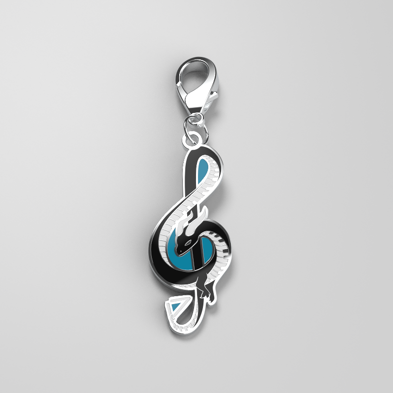 A TeeTurtle Musical Dragon Enamel Keychain featuring a musical note charm on a white background, perfect for showcasing personal style.