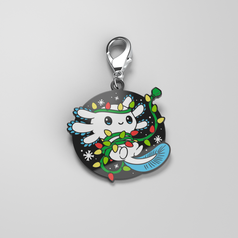 A cute Tangled Up Axolotl Enamel Keychain by TeeTurtle featuring a teddy bear riding a reindeer, perfect for personal style expression.