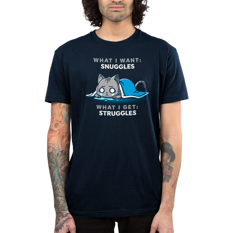 Premium Cotton T-shirt_TeeTurtle navy blue I Want Snuggles, I Get Struggles t-shirt featuring a crying cat hiding underneath a blanket.