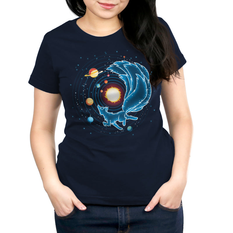 A woman wearing a navy blue t-shirt made of super soft ringspun cotton with a space-themed design featuring planets and the Kitsune Constellation, from monsterdigital.