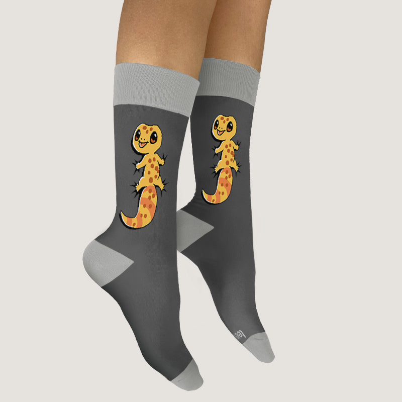 A pair of Gecko Socks by TeeTurtle with a pizza design that offer comfort and a great fit.