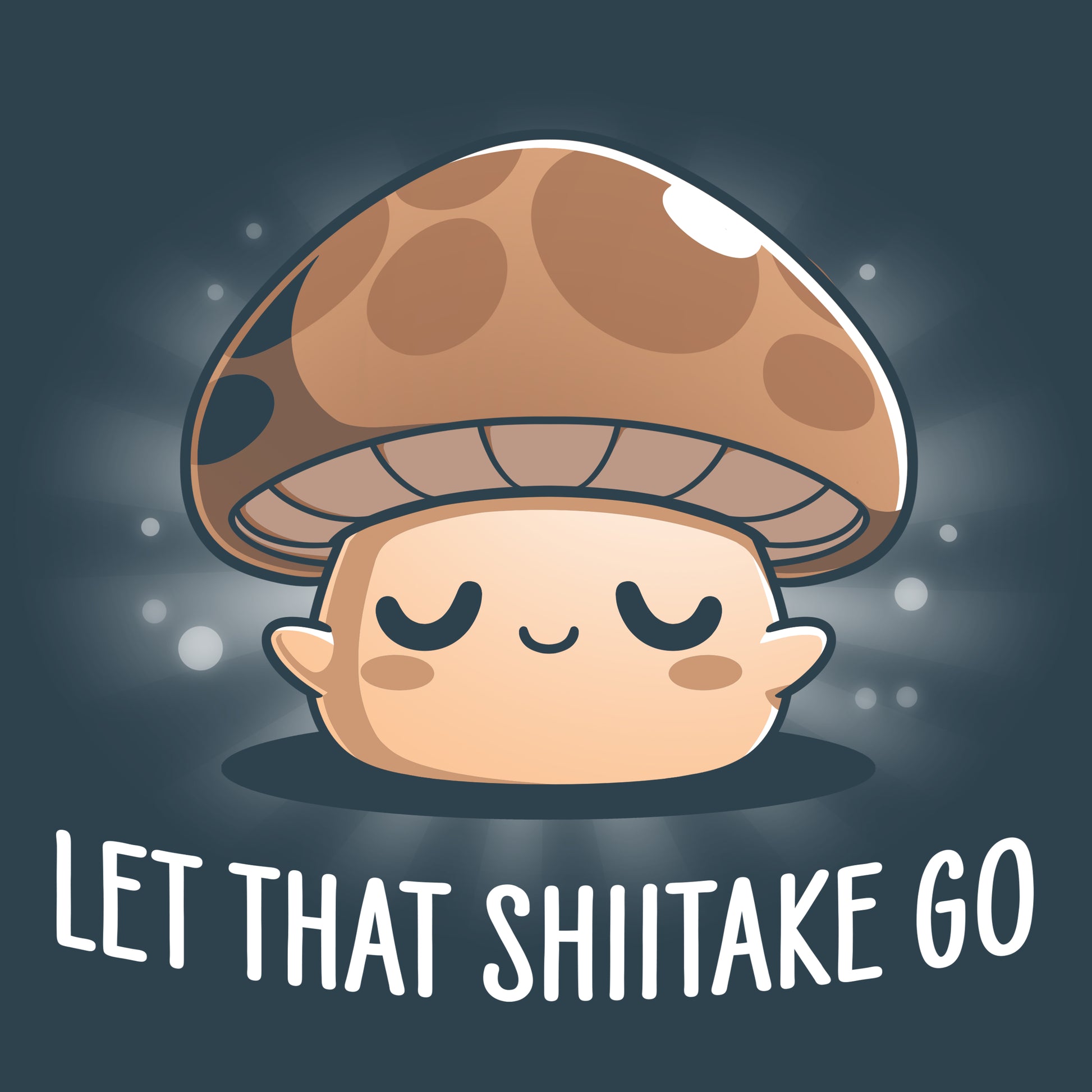 A TeeTurtle Let That Shiitake Go mushroom on a denim blue t-shirt.