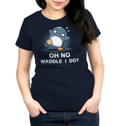 A person wearing a navy blue Waddle I Do? t-shirt by monsterdigital made from super soft ringspun cotton, featuring a cute penguin illustration and the text "OH NO WADDLE I DO?" stands with hands in pockets. This unisex tee perfectly combines comfort and style.