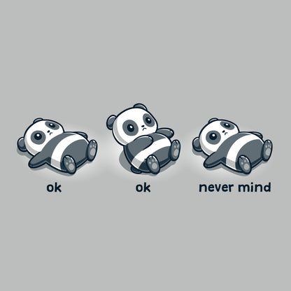 A TeeTurtle "Ok, Ok, Never Mind" T-shirt laying on a gray background with the words Ok never mind.