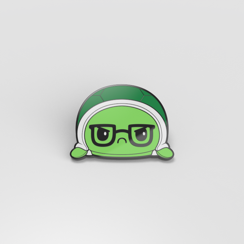 An Angry Green (Glasses) Turtle Pin by TeeTurtle on a white background, available as enamel pins.
