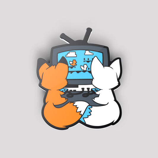 Two foxes stay together while watching the Fur The Love of Gaming Pin by TeeTurtle.
