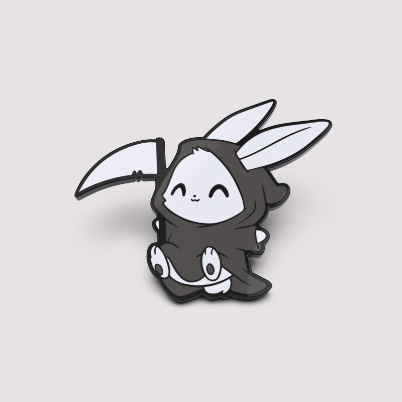 A black and white image of a bunny with a scythe, available as the Hippity Hoppity Your Soul is My Property Pin by TeeTurtle.