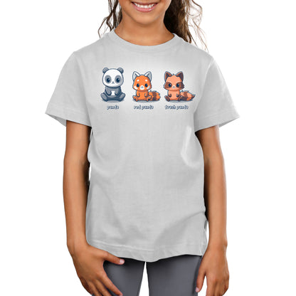 A girl wearing a grey t-shirt with three TeeTurtle panda bears on it.
