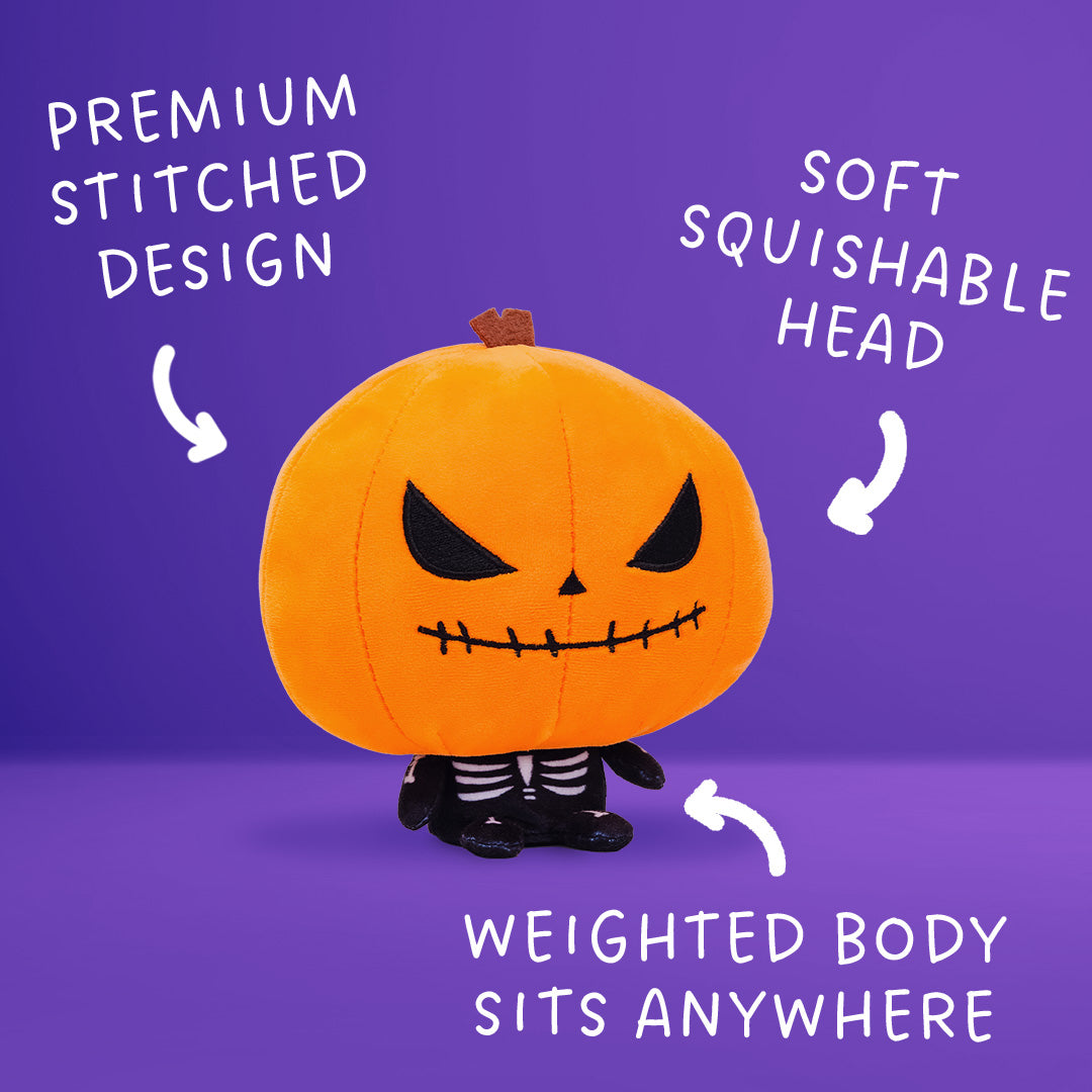 Cloudheads: 5" Pumpkin (Punkin) - A pumpkin headed skeleton plushie with a bright orange head, black stitched eyes and mouth, a small brown stem, and a black-and-white skeleton body. There is a purple background and the text "premium stitched design" "soft squishable head" and "weighted body sits anywhere." 