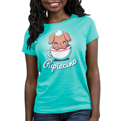 A woman wearing a TeeTurtle Caribbean Blue Pupiccino T-shirt with a dog in a cup.