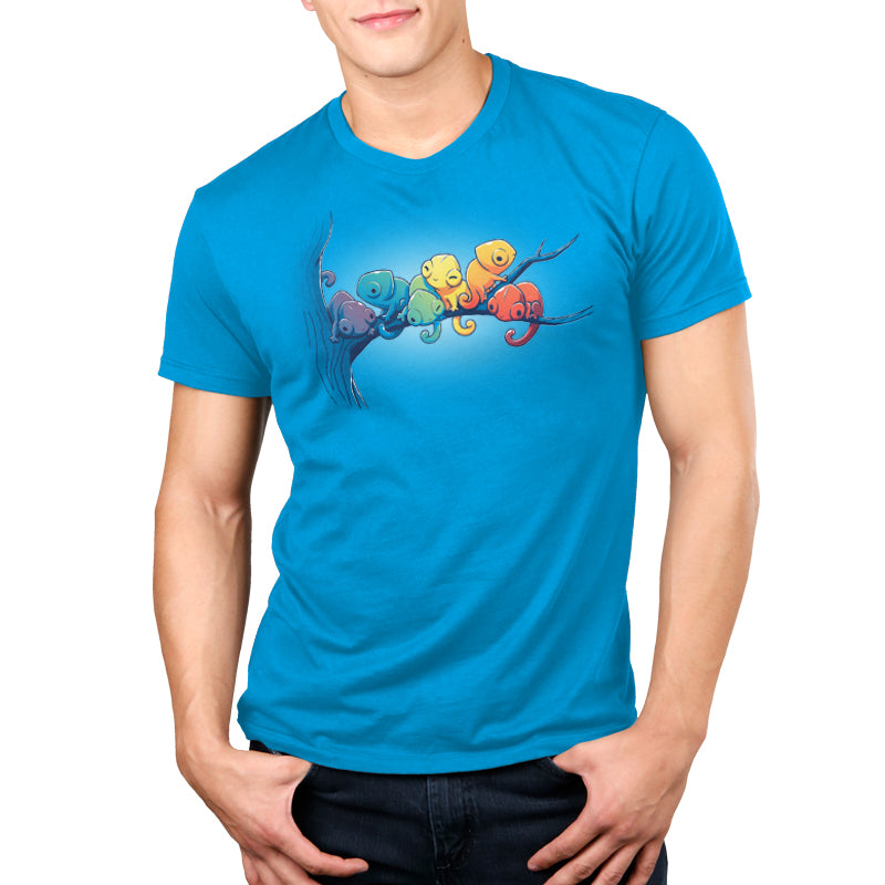 Premium Cotton T-shirt_Teeturtle Rainbow Chameleons Cobalt Blue Featuring a group of six chameleons relaxing on a tree branch, each a different color.