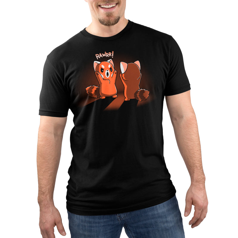 A man wearing a comfortable Rawrr! T-shirt with two foxes on it.