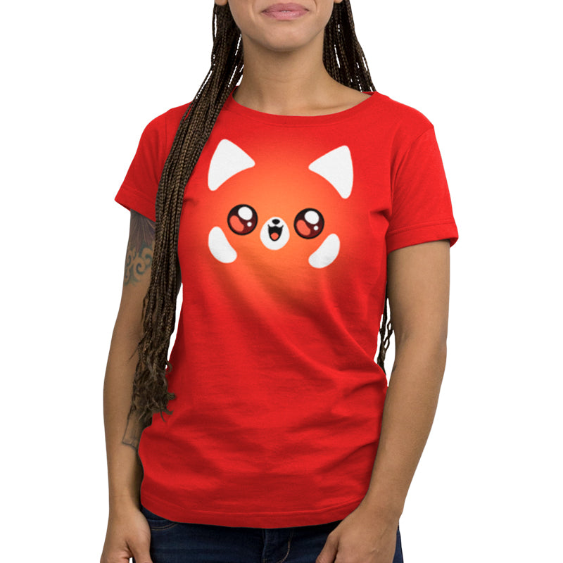 A woman wearing a TeeTurtle Red Panda T-Shirt with an adorable animal on it.