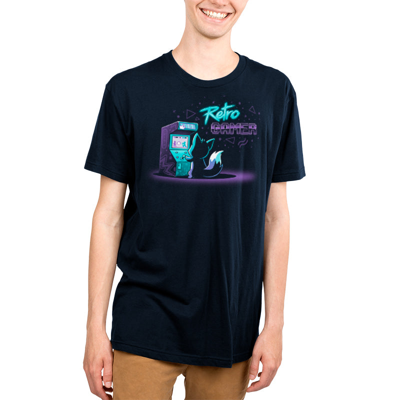 A young man wearing a Retro Gamer t-shirt by TeeTurtle, representing his love for video games like PlayStation 2 and Nintendo 64.
