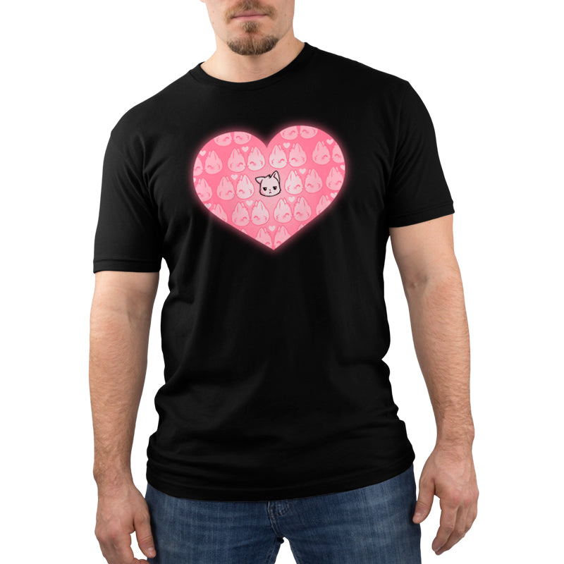 A man wearing a black All by Meowself T-shirt with a pink heart on it from TeeTurtle.
