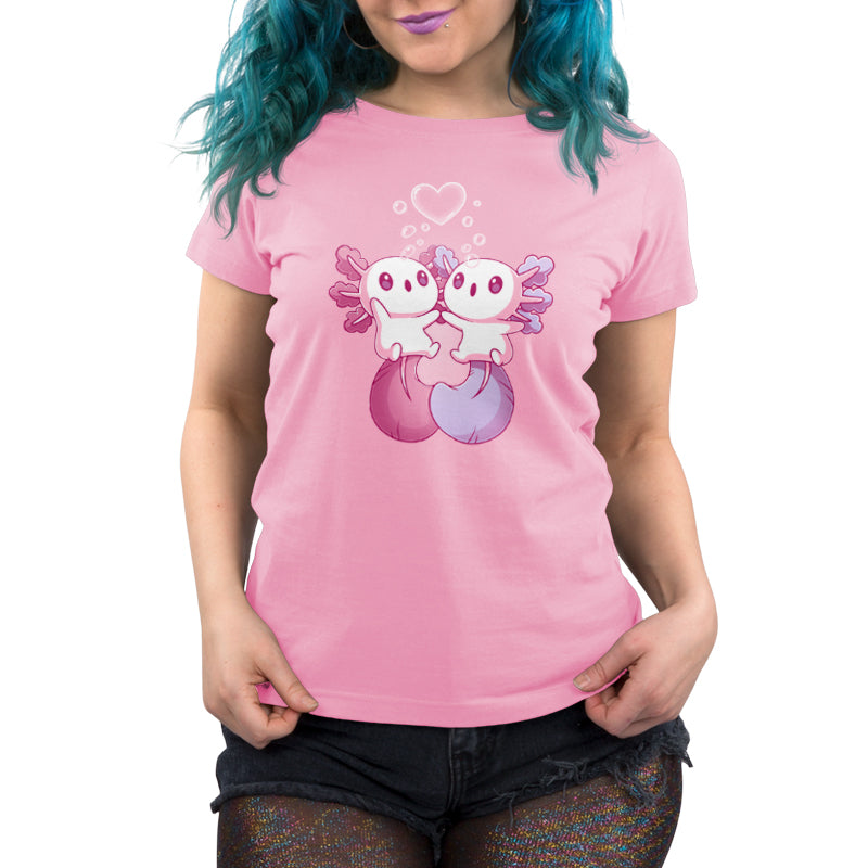 A woman wearing an Alotl Love cotton pink T-shirt from TeeTurtle.
