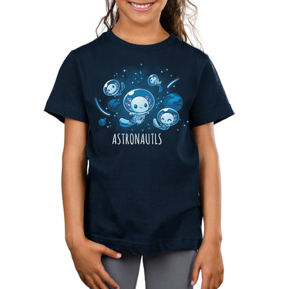 A girl wearing an Astronautls t-shirt from TeeTurtle that says "astronomy" while surrounded by friends.