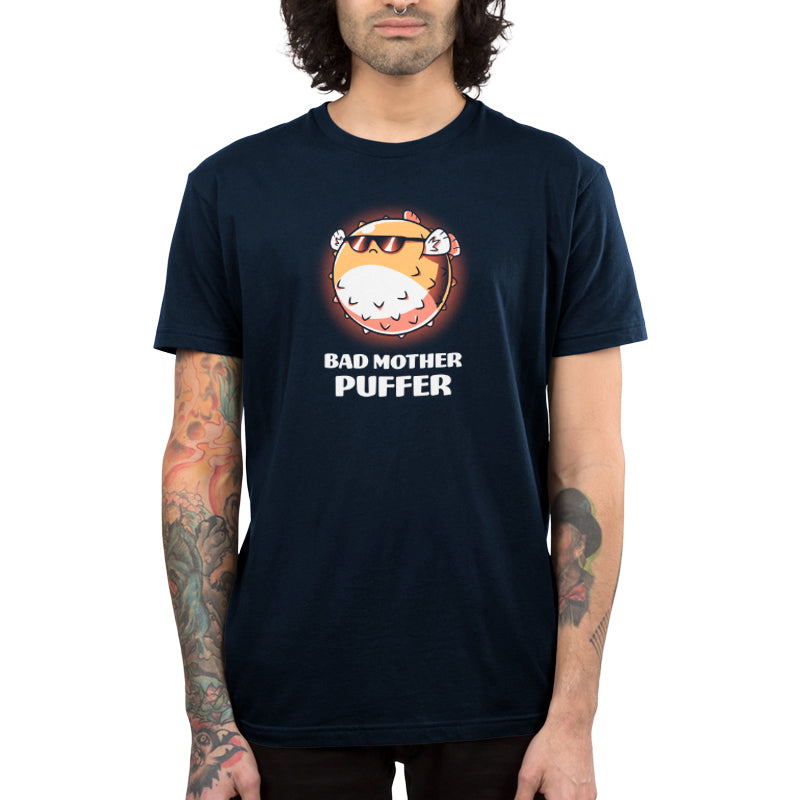 A man wearing a Navy Blue T-shirt by TeeTurtle that says, "i'm a Bad Mother Puffer".