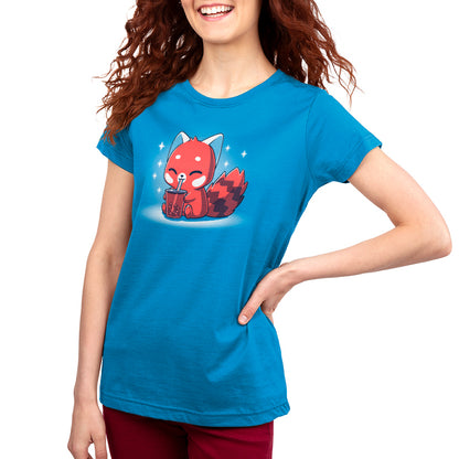 A woman wearing a blue TeeTurtle t-shirt with a Boba Red Panda on it.