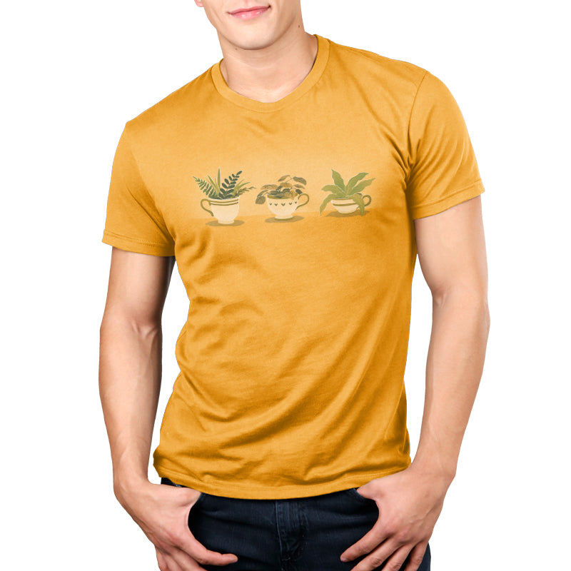 A man in a Botanical Brews, yellow TeeTurtle T-shirt.