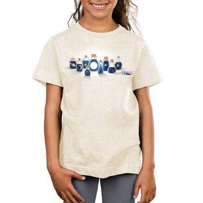 A girl wearing a TeeTurtle Bottled Solar System t-shirt.