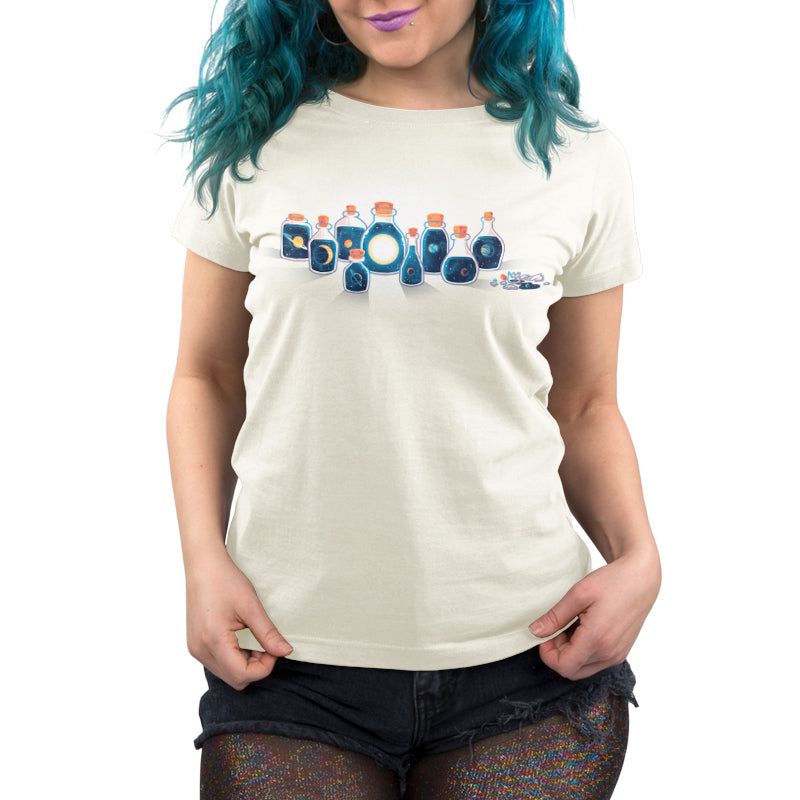 A woman with blue hair is wearing a TeeTurtle t-shirt for comfort featuring the Bottled Solar System design.