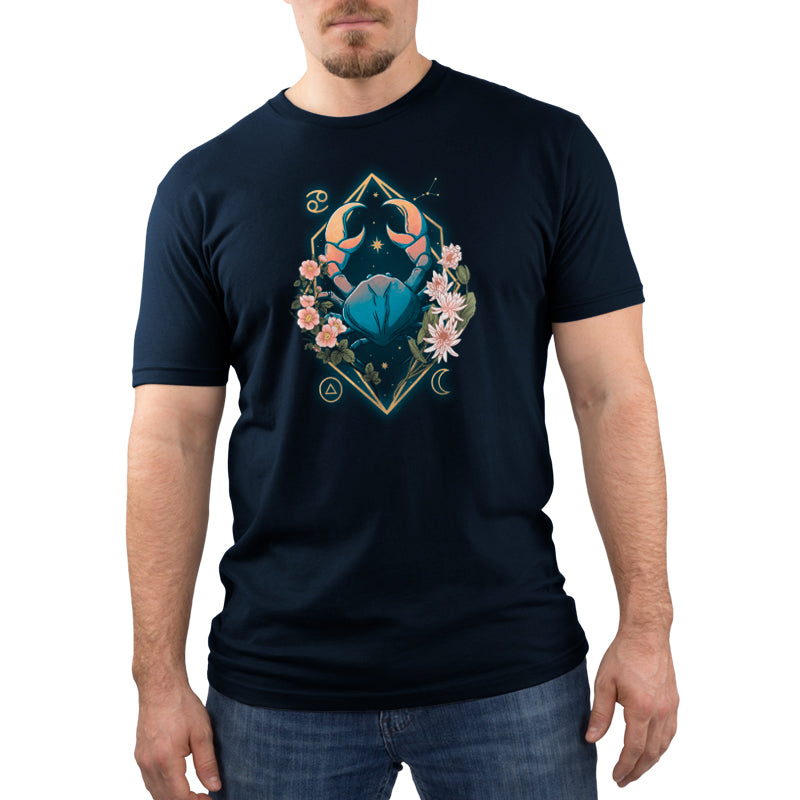 A nurturing Cancer Zodiac man wearing a navy blue TeeTurtle t-shirt.