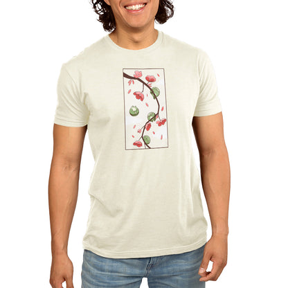 A man wearing a TeeTurtle cotton t-shirt with an image of Cherry Blossom Frogs.