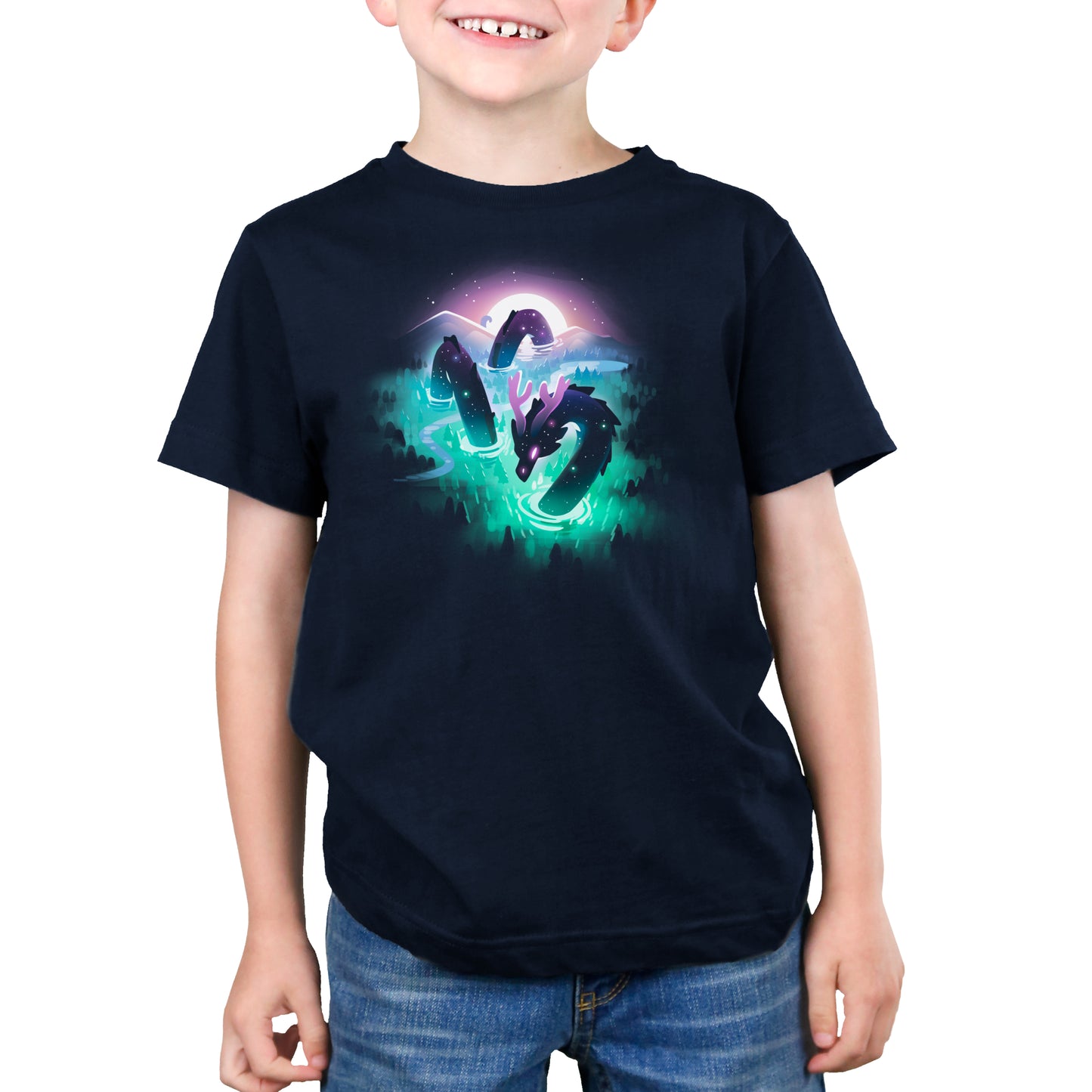 Young boy smiling, wearing a navy blue t-shirt with a Cosmic Colors dinosaur graphic by monsterdigital.
