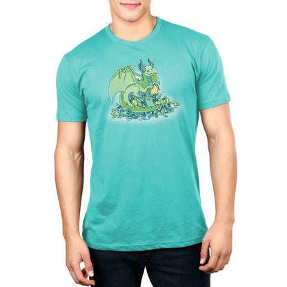 A man wearing a Craft Hoarder turquoise t-shirt with a dragon on it. (Brand: TeeTurtle)