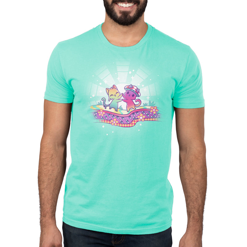 A man wearing a turquoise Dancing Cats T-shirt with a funky feline unicorn on it from TeeTurtle.
