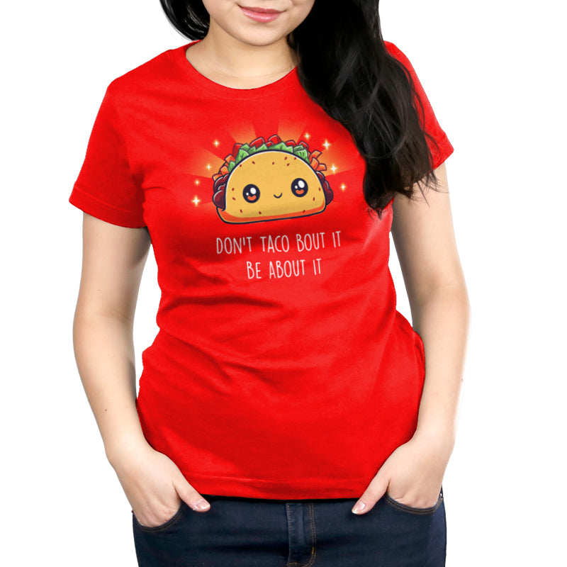 Premium Cotton T-shirt - A person wearing a super soft ringspun cotton red apparel featuring a cute taco graphic and the text “Don’t taco bout it, be about it.” This unisex tee, Don't Taco Bout It, Be About It by monsterdigital, is perfect for anyone who loves comfort and fun designs.