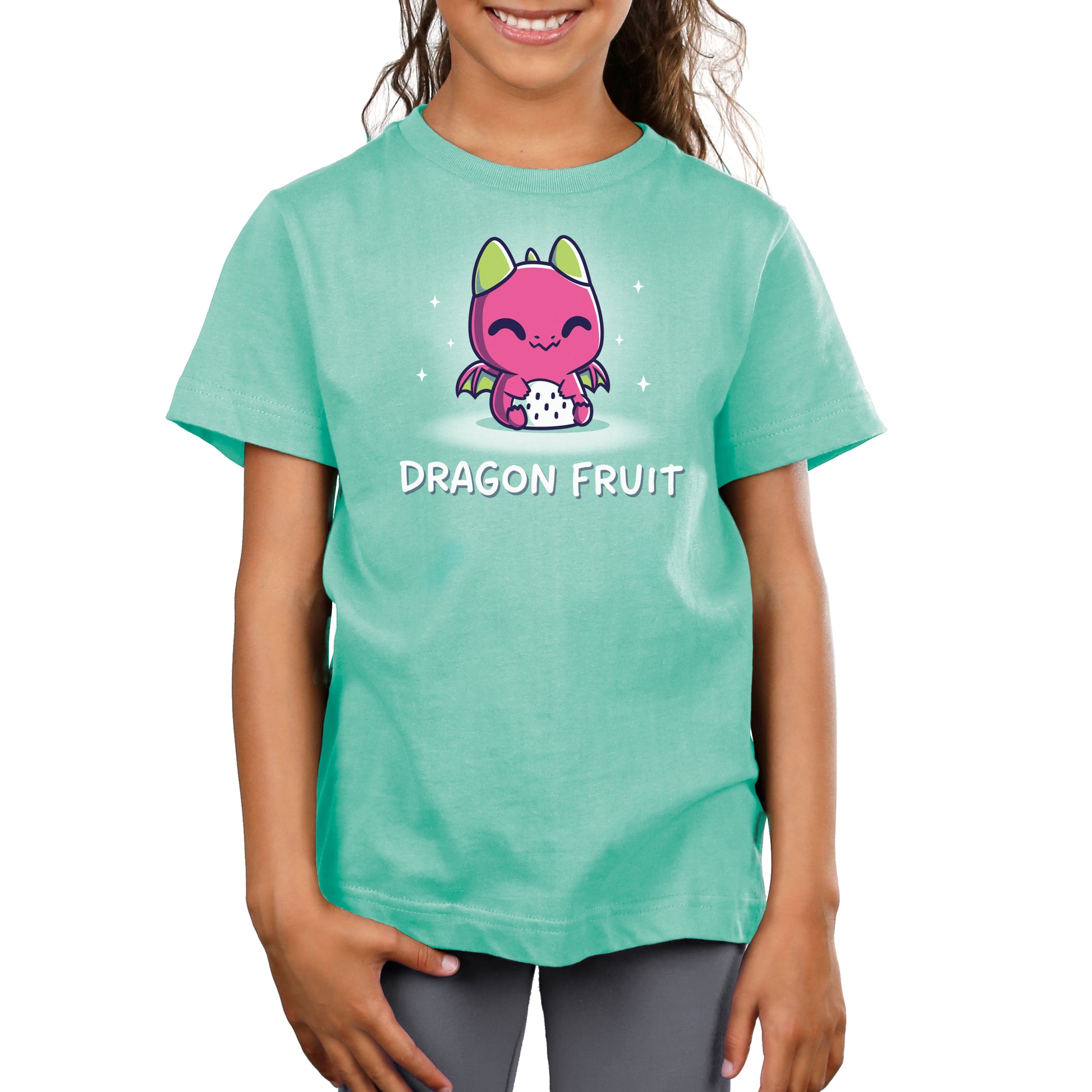 A girl wearing a TeeTurtle Saltwater Green Dragon Fruit t-shirt.