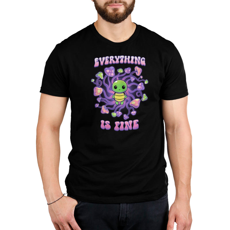A man wearing a black t-shirt that says "Everything Is Fine" and is designed by TeeTurtle chill-ly.