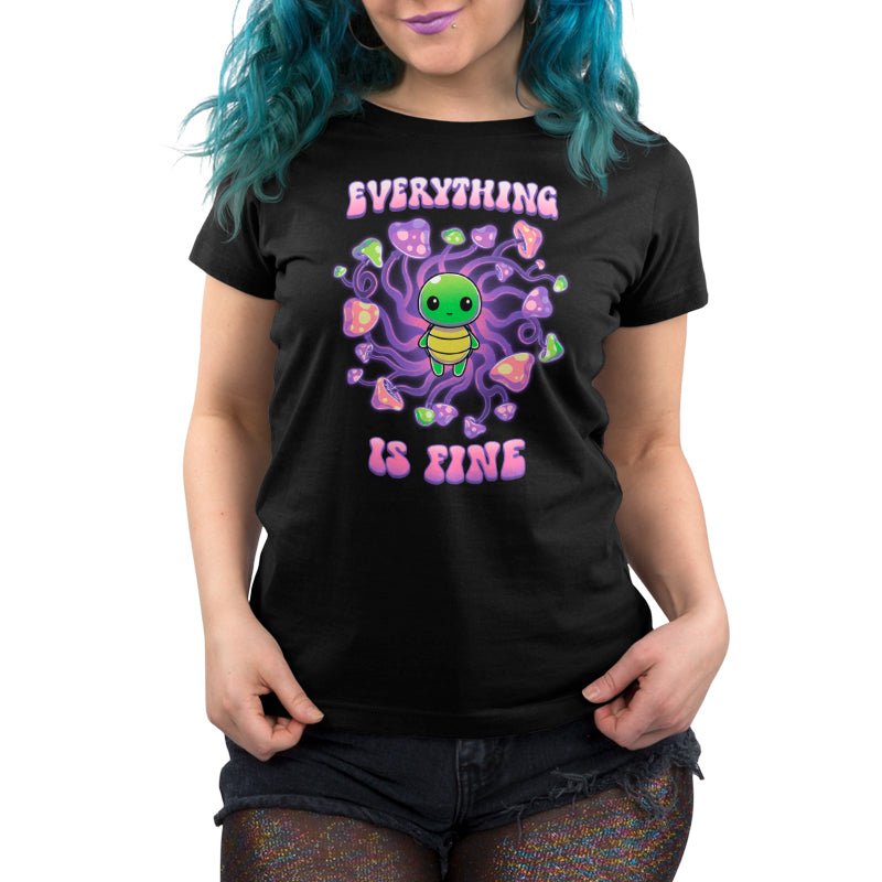 A woman wearing a TeeTurtle "Everything Is Fine" t-shirt in black.