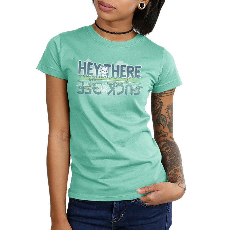 A woman wearing a TeeTurtle T-shirt with a playful message "hey there sick see F*** Off".