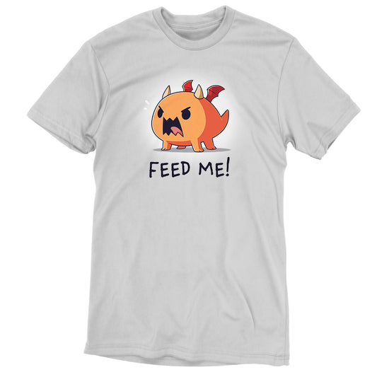 An Unstable Games silver dragon t-shirt that says Feed Me!.