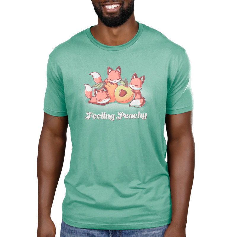 A man wearing a Feeling Peachy t-shirt by TeeTurtle.