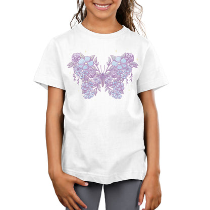 A girl wearing a white t-shirt with a Floral Butterfly by TeeTurtle original design.