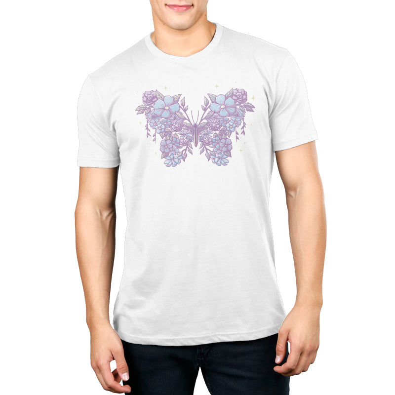A man wearing a white t-shirt with a Floral Butterfly by TeeTurtle on it.