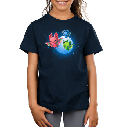 A girl wearing a blue t-shirt with Fruit Bats cartoon characters on it by TeeTurtle.