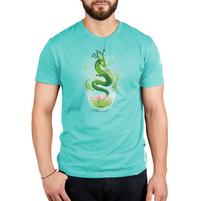 A man wearing a Green Tea Dragon t-shirt from TeeTurtle.
