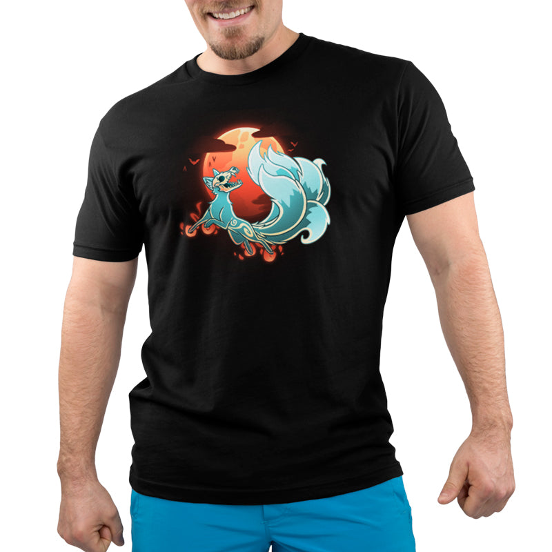 A man wearing a black t-shirt featuring an image of a pokemon, inspired by TeeTurtle's harrowing cry, Grim Kitsune.